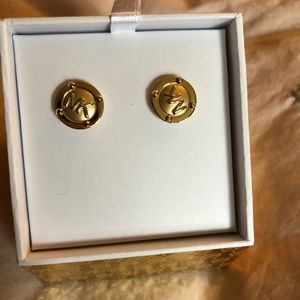 Micheal Kors earnings